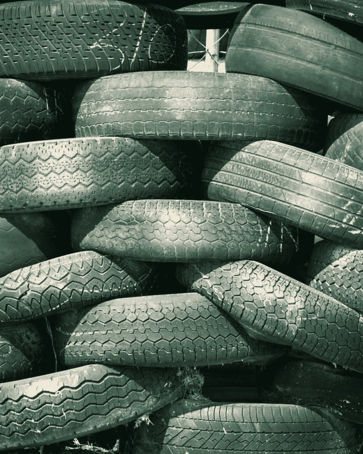 Stacked used tyres